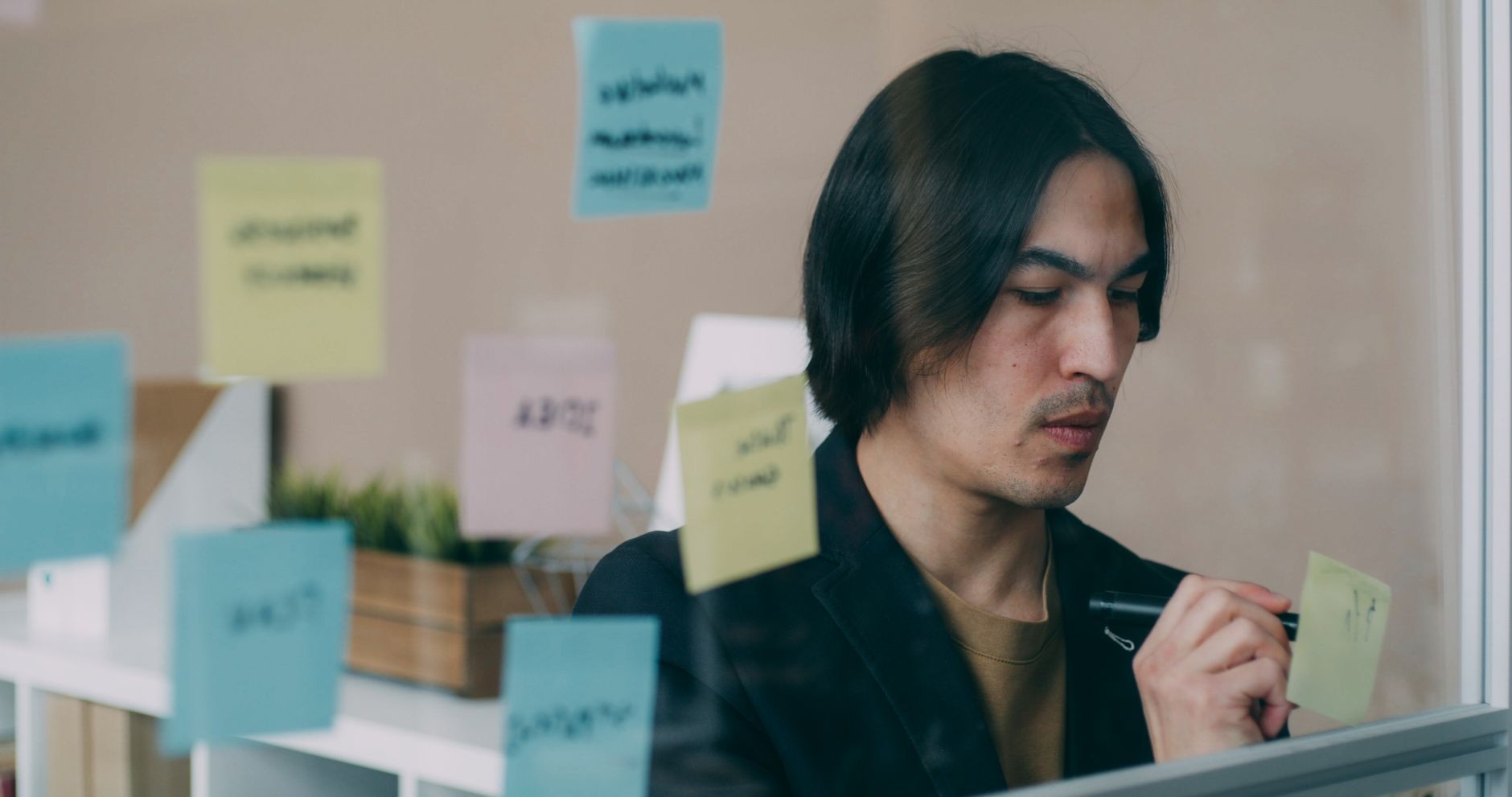 Professional mapping workflow notes on a glass wall