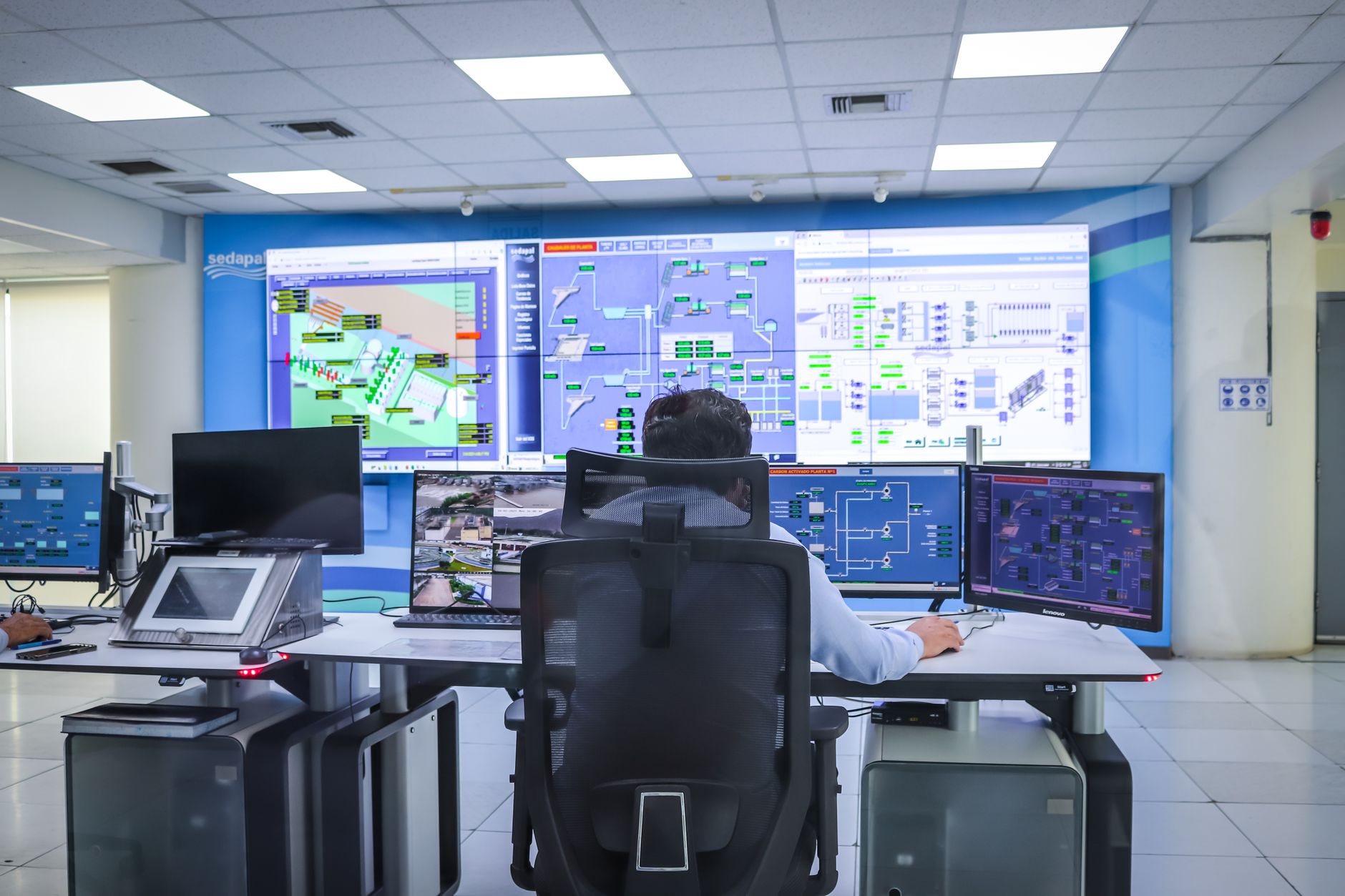 Operator managing a technology command center